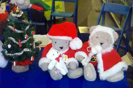 Mr. & Mrs. Santa in the Windows